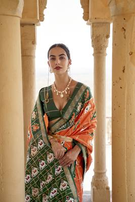 Orange woven silk saree with blouse 2