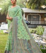 Light green woven silk saree with blouse