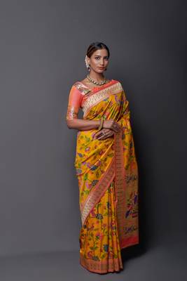 Yellow woven silk saree with blouse 1