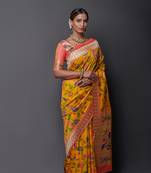 Yellow woven silk saree with blouse