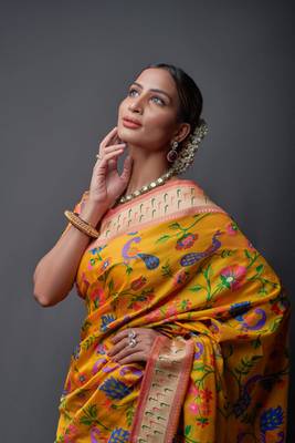 Yellow woven silk saree with blouse 2