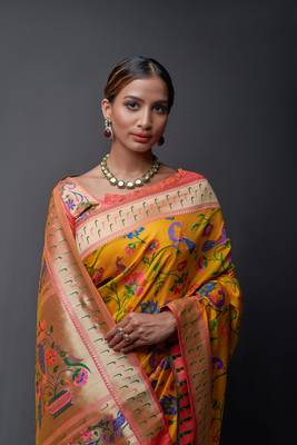 Yellow woven silk saree with blouse 5