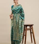 Green woven banarasi silk saree with blouse