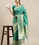 Green woven banarasi silk saree with blouse