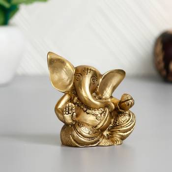 brass ganesha idol with modak 1