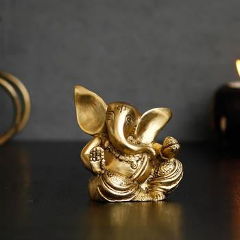 brass ganesha idol with modak 2