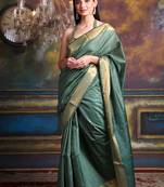 This is   Green Blended Silk soft saree with zari border from Charukriti