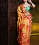 This is   Mustard Blended Silk soft tie dye saree from Charukriti