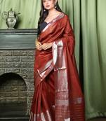 This is   Garnet Red Blended Silk saree with temple border from Charukriti