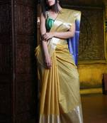 This is   Light Yellow Blended Silk saree with temple border from Charukriti