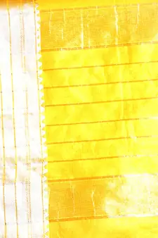 This is   Yellow Blended Silk saree with temple border from Charukriti