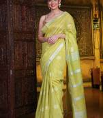 This is   Lime Green Blended Silk soft saree with textured design from Charukriti