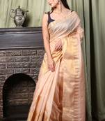 This is   Beige Blended Silk soft saree with textured design from Charukriti