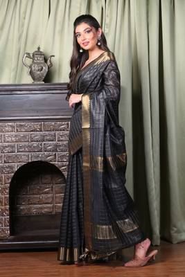 This is   Black Blended Silk saree with temple border from Charukriti 2