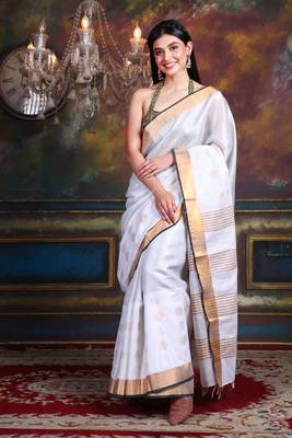 This is   White Tissue soft saree with polka dots from Charukriti 1