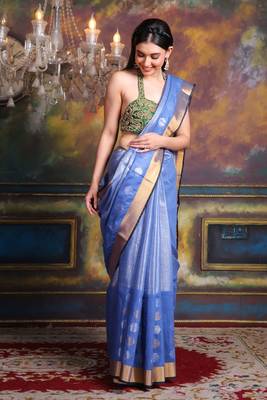This is   Light Blue Tissue soft saree with polka dots from Charukriti 1