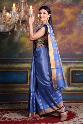 This is   Light Blue Tissue soft saree with polka dots from Charukriti 2