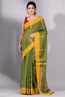 This is   Green Tissue handwoven saree with yellow border from Charukriti