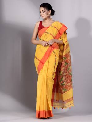 This is   Yellow Tissue handwoven saree with red border from Charukriti 4