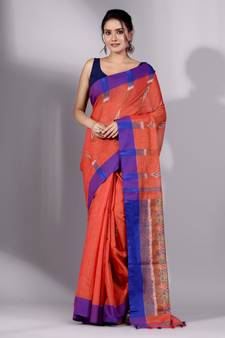 This is   Red Tissue handwoven saree with Blue border from Charukriti