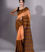This is   Orange Cotton Handspun soft saree with floral weaving from Charukriti