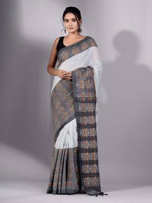 This is   Cream Cotton Handspun soft saree with floral weaving from Charukriti 1