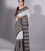 This is   Cream Cotton Handspun soft saree with floral weaving from Charukriti