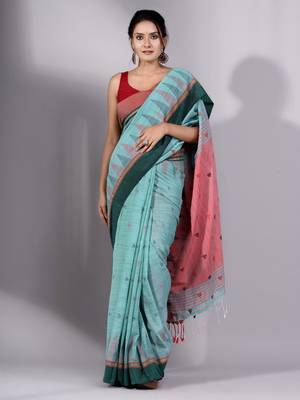 This is   Green Cotton Handspun soft saree with temple border from Charukriti 1