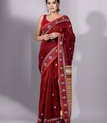 This is   Wine Red Cotton soft handwoven saree with geomatric design in pallu from Charukriti