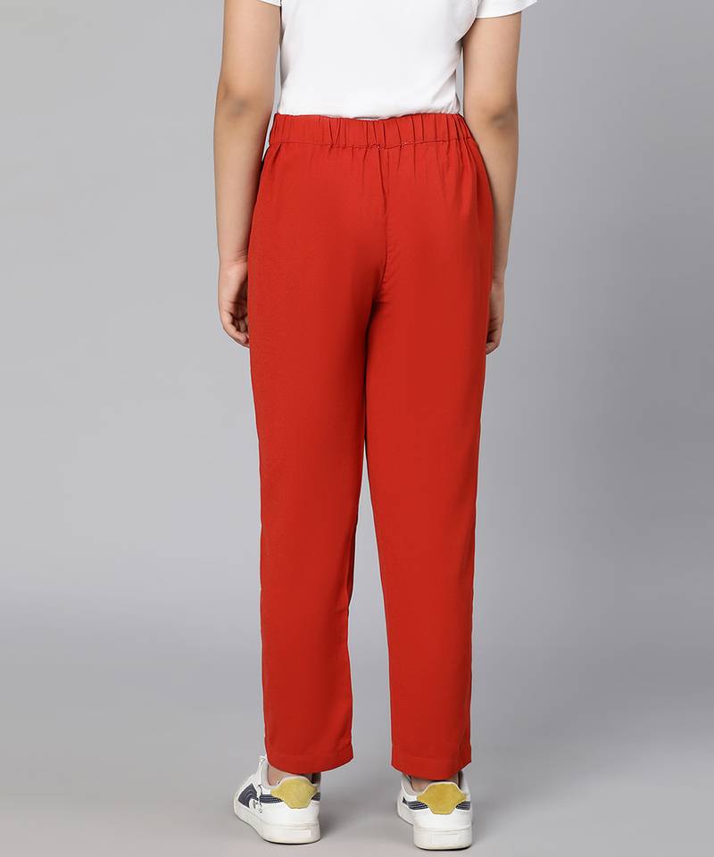 Solid rust color elasticated girl pant