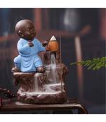 eCraftIndia Karate Style Monk Buddha Decorative Showpiece with 10 free Smoke Backflow Scented Cone Incenses