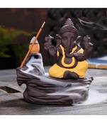 eCraftIndia Yellow Lord Ganesha Decorative Showpiece with 10 free Smoke Backflow Scented Cone Incenses