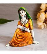 eCraftIndia Resting Rajasthani Lady Handcrafted Decorative Polyresin Showpiece