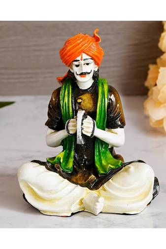 eCraftIndia Colorful Rajasthani Man Playing Musical Instrument Handcrafted Decorative Polyresin Showpiece