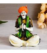 eCraftIndia Colorful Rajasthani Man Playing Musical Instrument Handcrafted Decorative Polyresin Showpiece