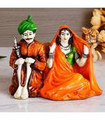 eCraftIndia Colorful Sitting Rajasthani Couple Handcrafted Decorative Polyresin Showpiece