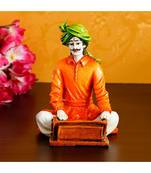 eCraftIndia Colorful Rajasthani Man Playing Harmonium Handcrafted Decorative Polyresin Showpiece