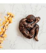 eCraftIndia Man in Baby like Pose in Mother Womb Antique Finish Handcrafted Polyresin Wall Decorative