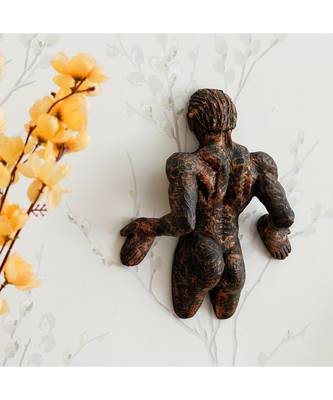 eCraftIndia Man Pushing Wall Antique Finish Handcrafted Polyresin Wall Decorative 1