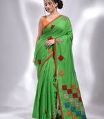 This is  Green Pure cotton handwoven saree with abstract designs from Charukriti