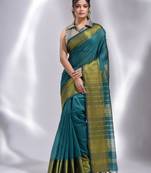 This is  Teal Blended Cotton handwoven soft saree with temple border from Charukriti