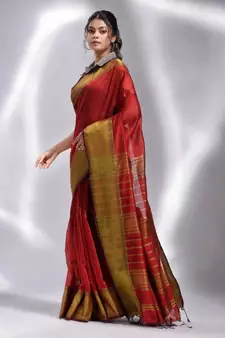 This is   Red Blended Cotton handwoven soft saree with temple border from Charukriti