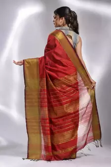 This is   Red Blended Cotton handwoven soft saree with temple border from Charukriti
