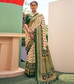Cream printed pure patola saree with blouse