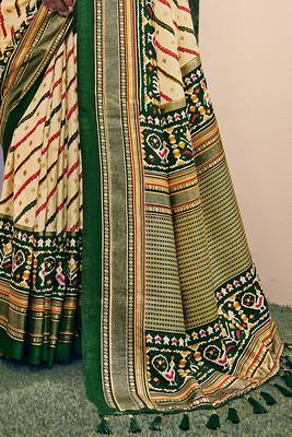 Cream printed pure patola saree with blouse 2