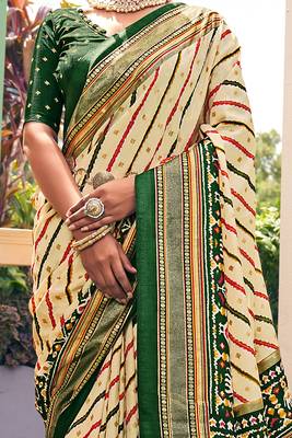 Cream printed pure patola saree with blouse 3