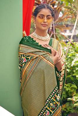 Cream printed pure patola saree with blouse 4