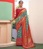 Turquoise printed pure patola saree with blouse