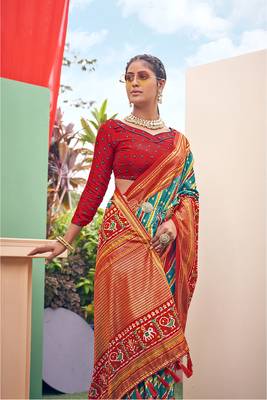 Turquoise printed pure patola saree with blouse 4