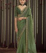 Graceful Olive Green thread, sequins embroidered Organza Saree with Blouse